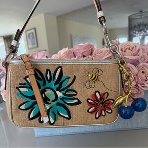 Coach vintage 2005 embroidered shoulder bag
Embroidered w/flowers & bee